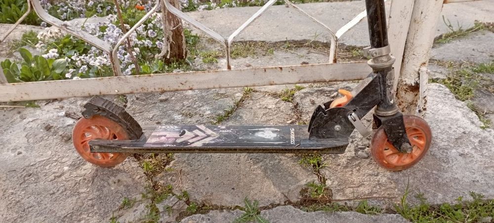 Спортивный самокат