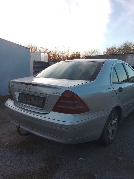 Мерседес Бенц W203