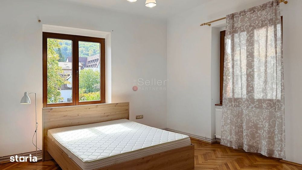 Apartament cu Acces la Curte Garaj Inclus
