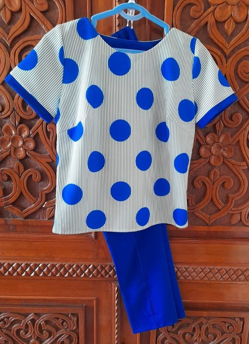 Аёл к,излар кастюмчиклари