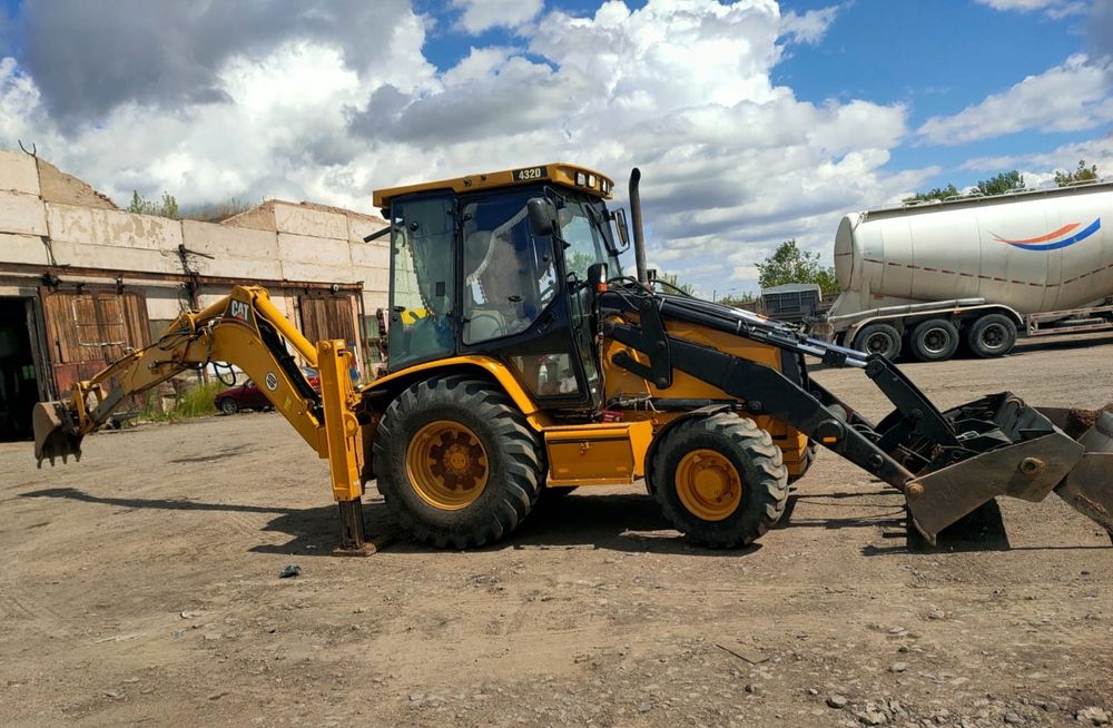 Услуги экскаватор-погрузчика