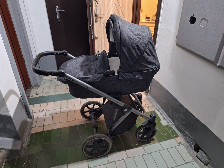 Детская передвижная коляска