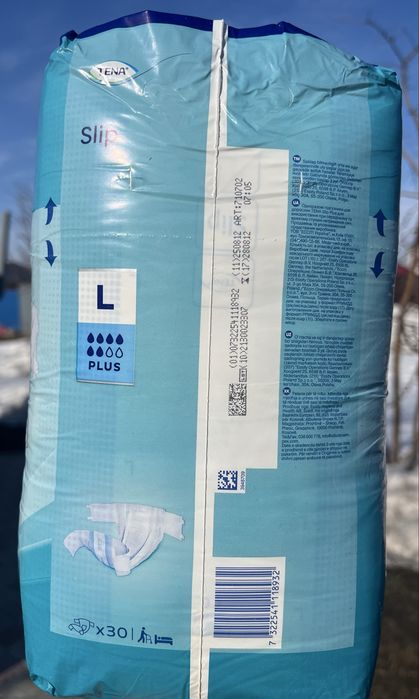 Продам памперсы Tena L размер