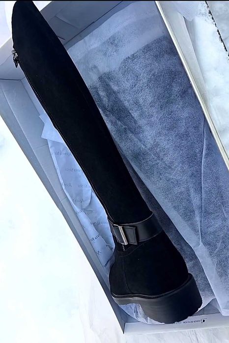 Продам женские сапоги