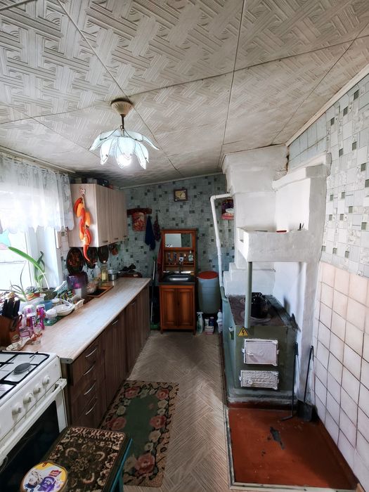 Дом в рабочем поселке (асфальтированный подъезд)