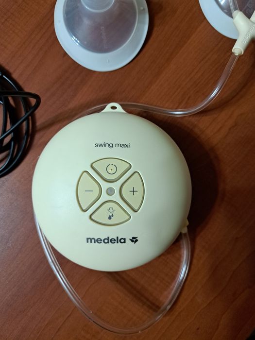 Двойна двуфазна помпа за кърма Medela - Swing Maxi