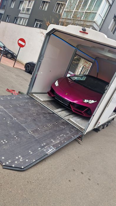 Tractare si transport autovehicule in platforma inchisa ,acoperita