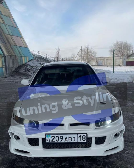 Передний бампер Митсубиси Галант 8 / Легнум