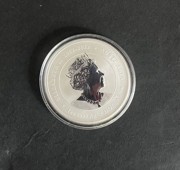 Серебряная монета год Дракона