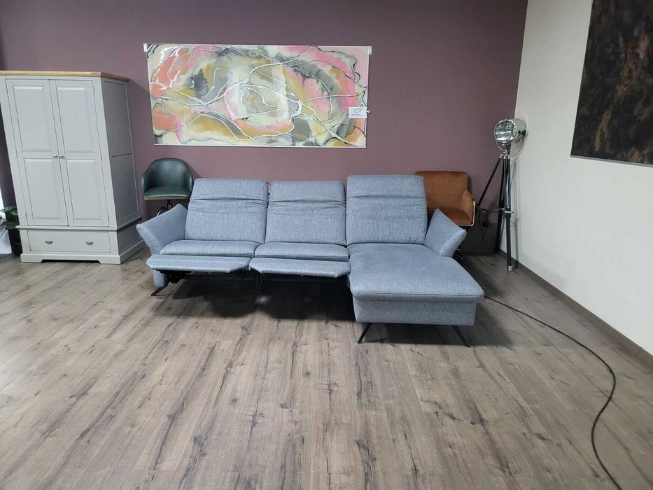 Сив ъглов диван от плат "HUKLA Interliving" с ел. релакс механизъм