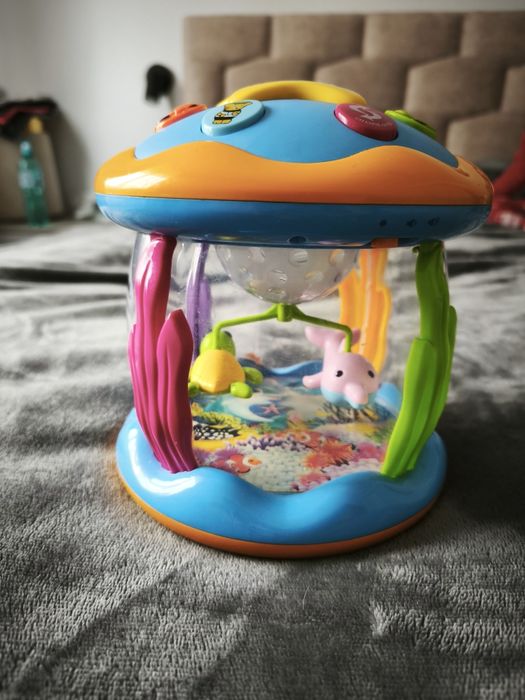 Jucărie bebelus cu delfini