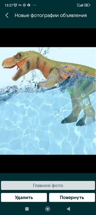 Игрушка большой динозавр