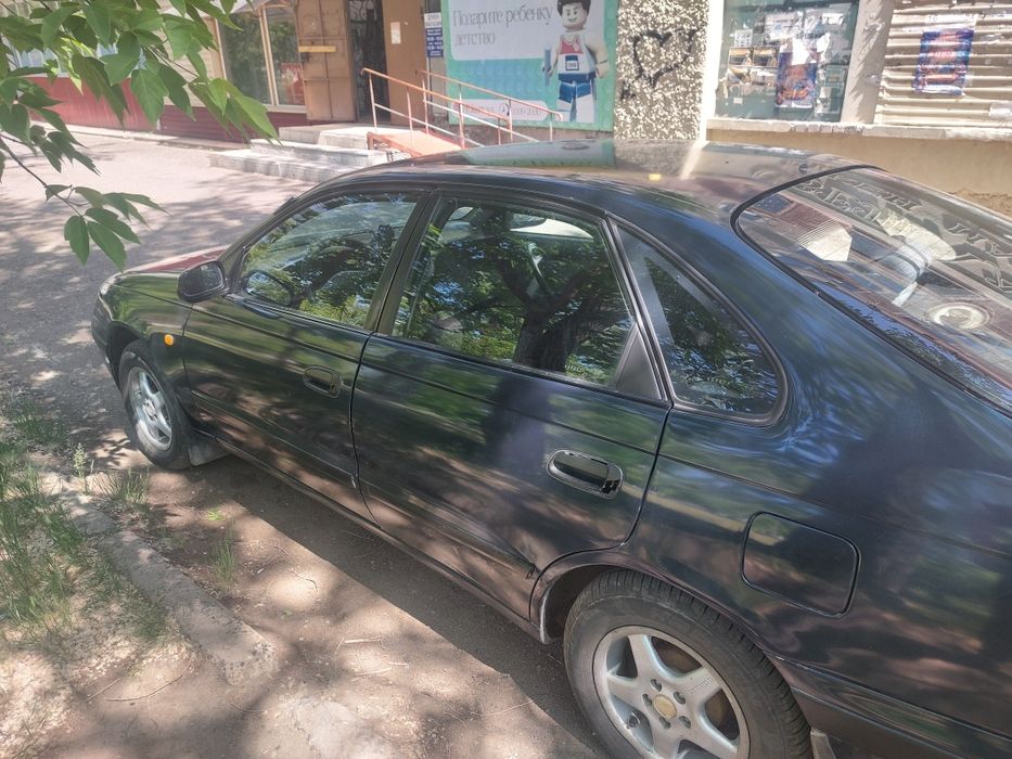 Продам Тойота Карина Е
