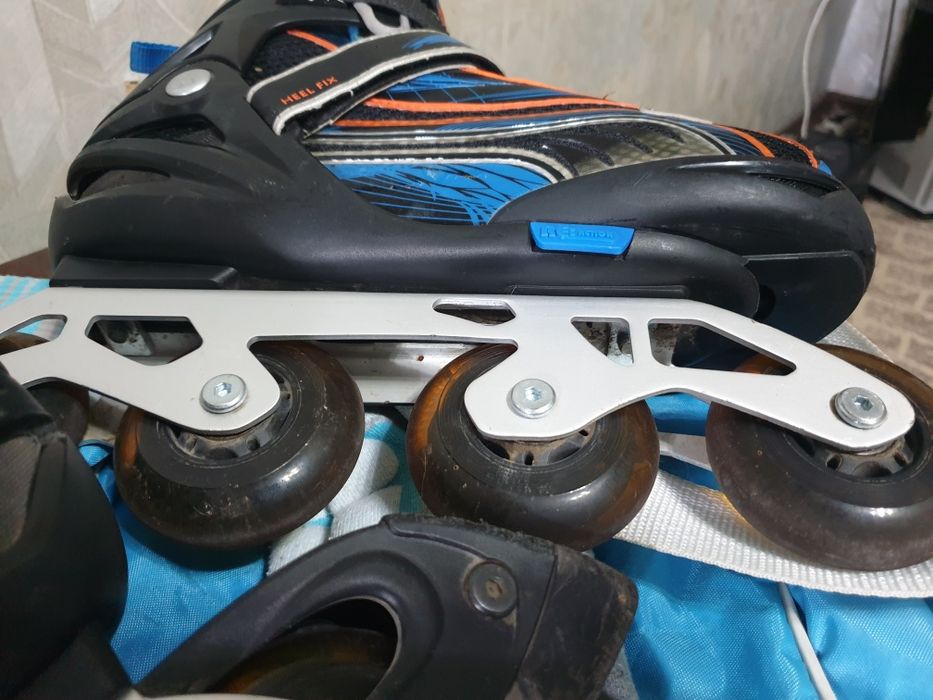 Роликовые коньки раздвижные р 36-41 б/у