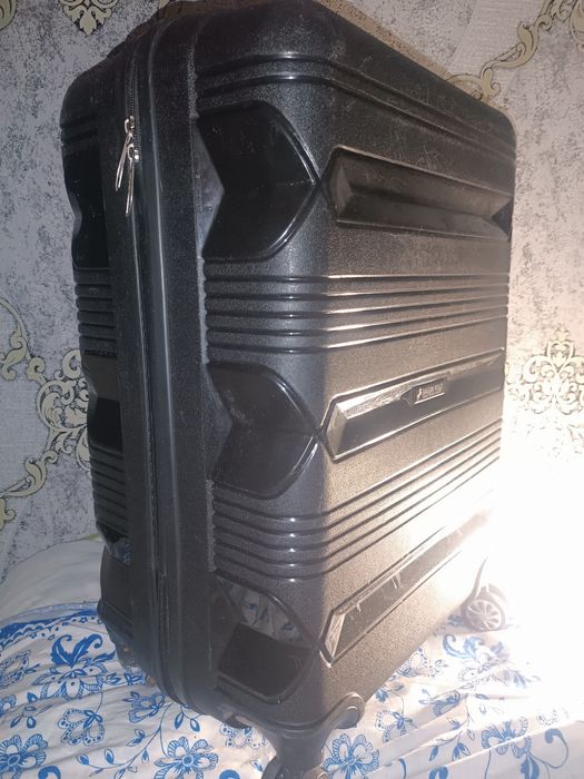 Чемодан марки Baggin Polo.