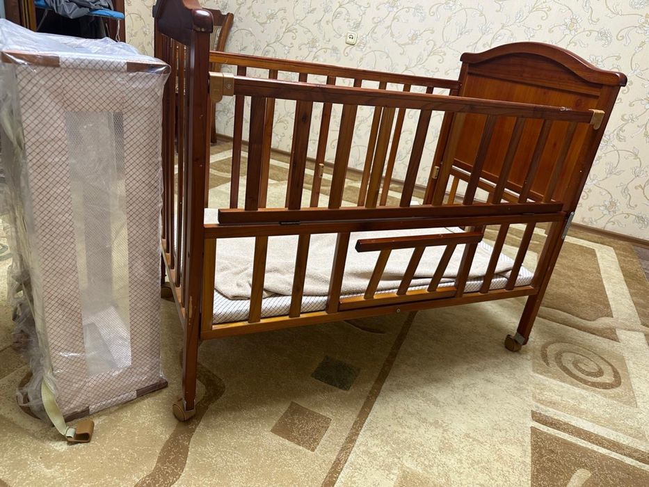 Детская кроватка с люлькой
