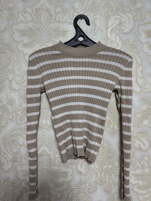 водолазка с доинным руковом