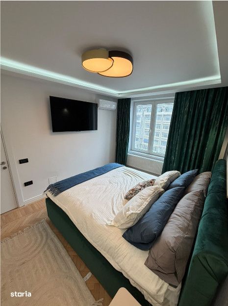 Apartament 2 camere| 2' metrou P-ta Romana| Centrala proprie|