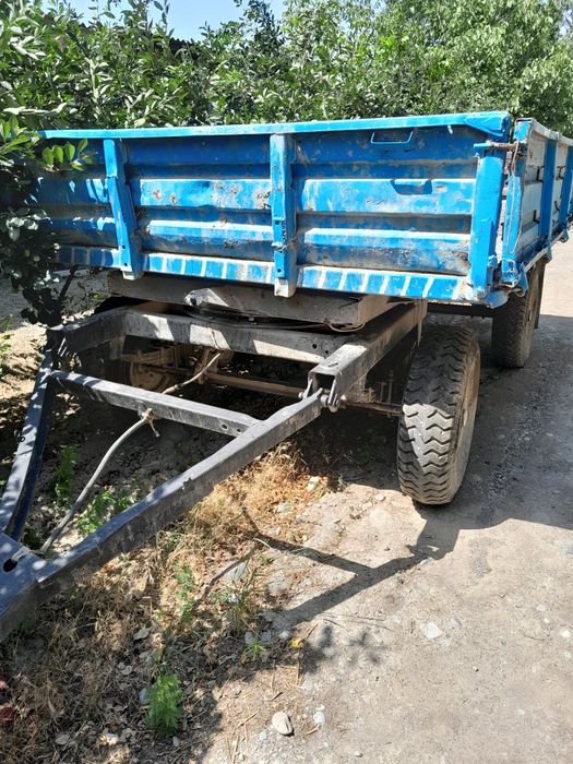 Трактор 28 прицепи билан
