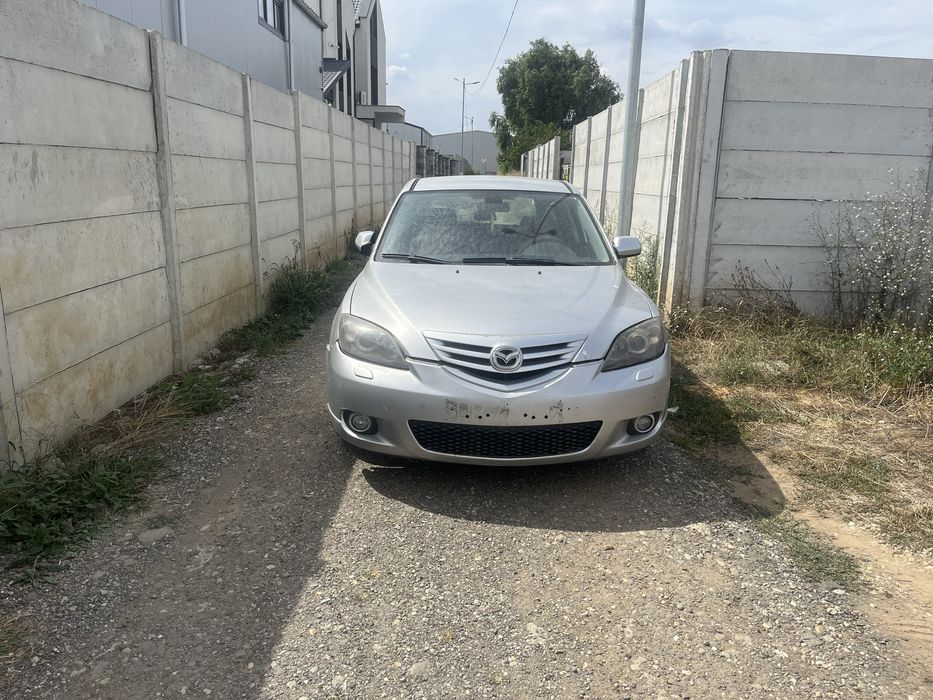 Vand far xenon stanga si dreapta Mazda 3! 2004-2008