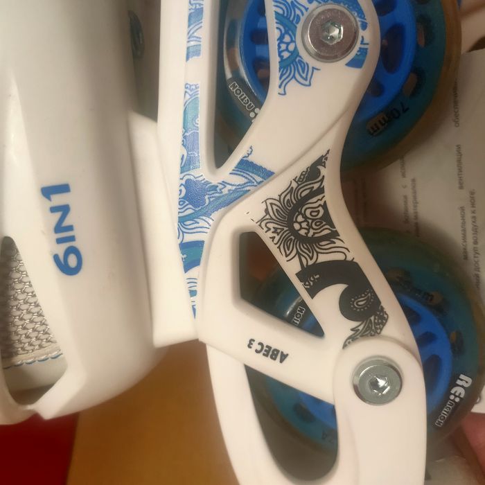 Роликовые коньки