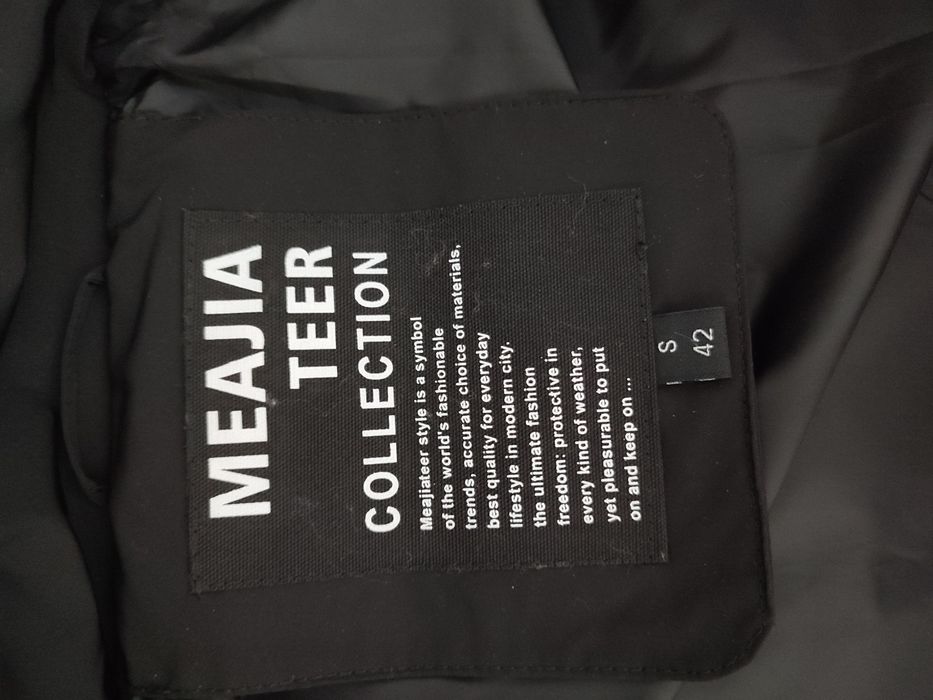 Продам зимний пуховик