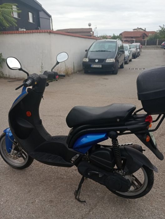 Peugeot скутер ..