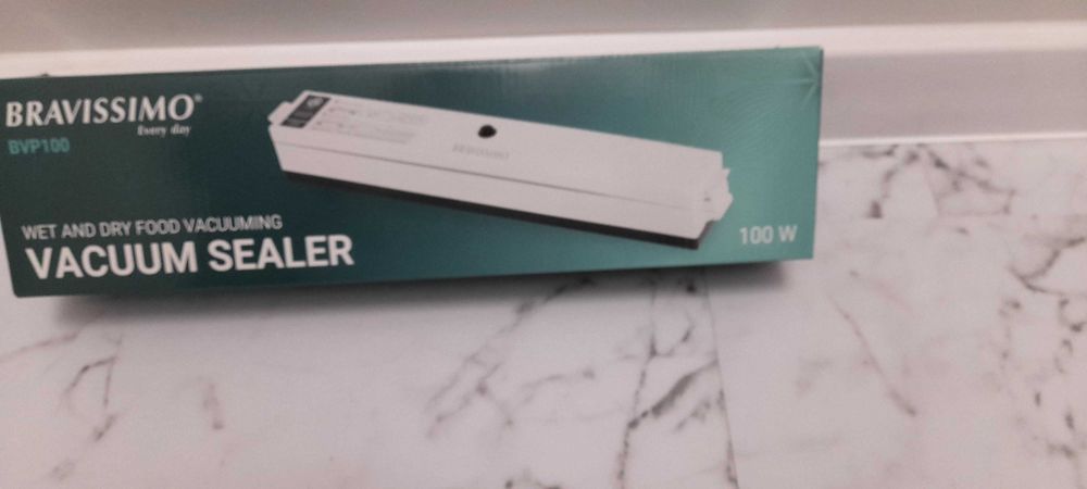 Машинка за вакумиране.