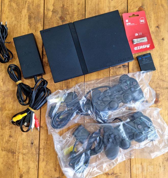PlayStation 2 slim + 20 games