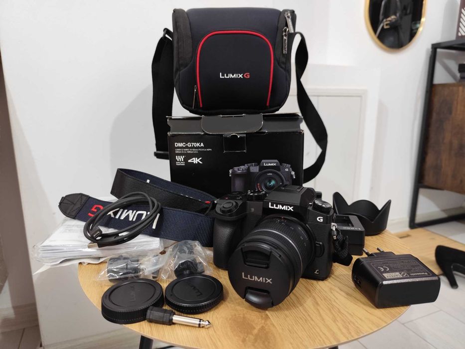 Panasonic Lumix G70 + Obiectiv 14–42mm + Geantă – Ca nouă
