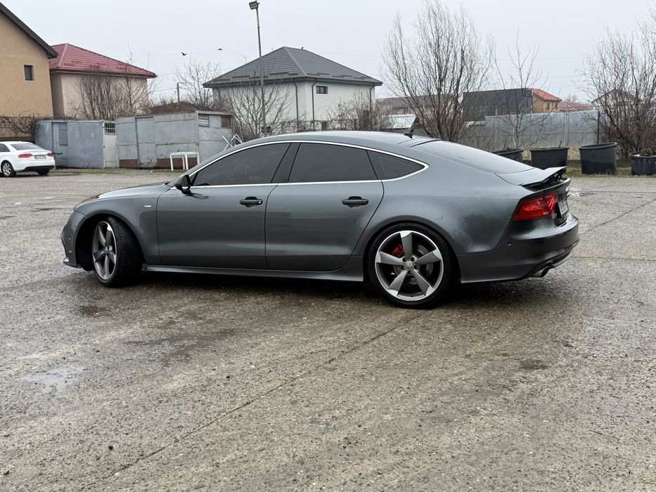 Audi RS7 bi-turbo 313 cp