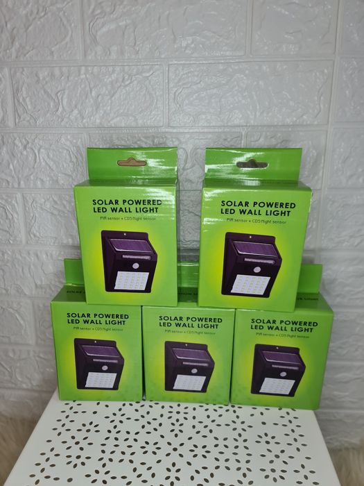 100lei Livrare GRATUITA set 4 lămpi solare perete/gard