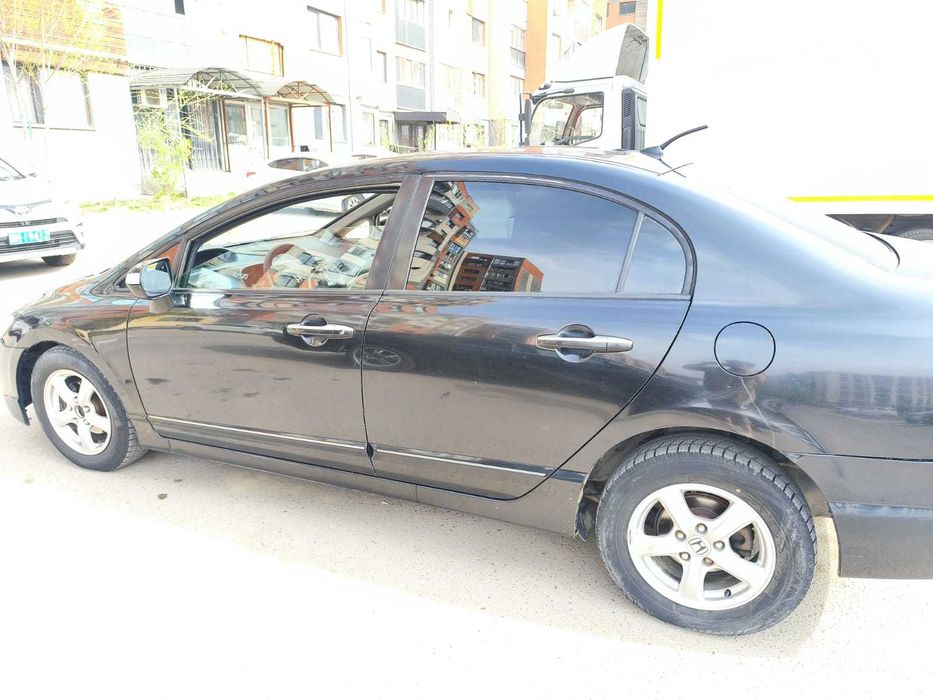 Honda Civic Гибрид 2009 г.