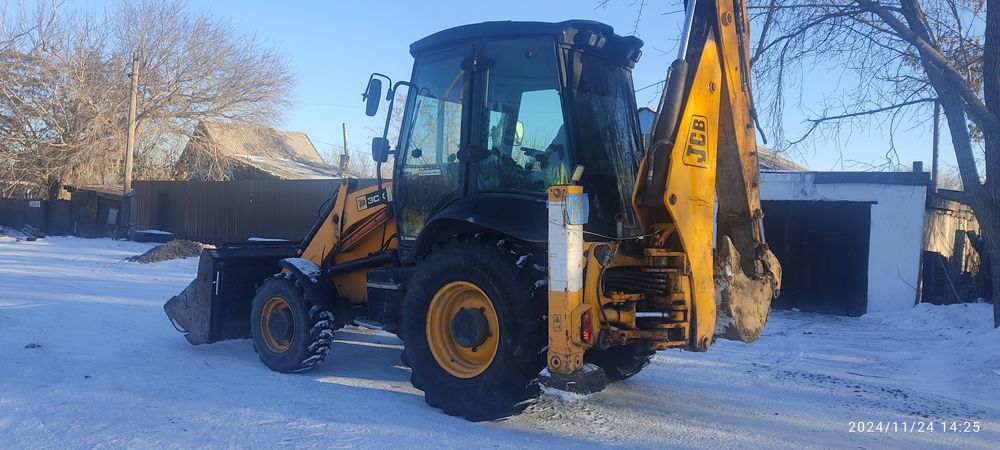 Услуги экскаватор-погрузчик