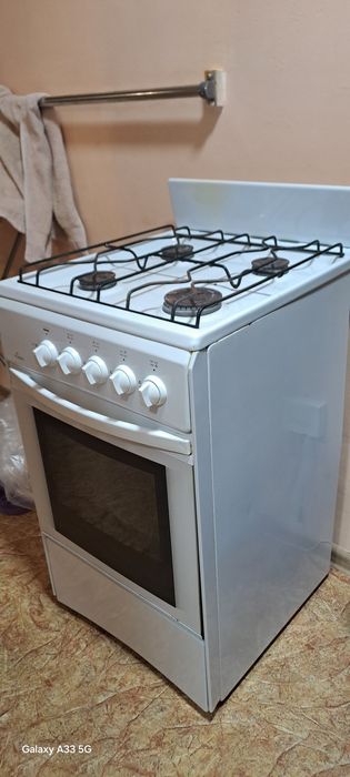 Газ плита в рабочем состояние