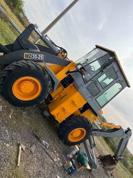 Услуги экскаватора погрузчика