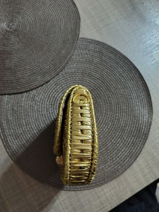 Vând jeanta hand made aurie