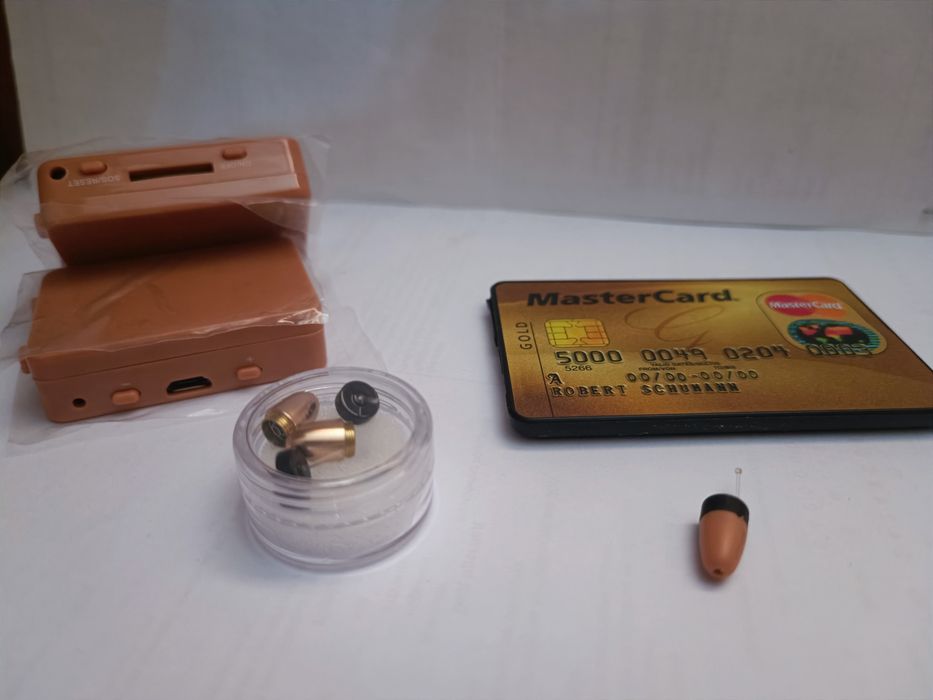 Микро Слушалка за преписване с GSM приемник без примка