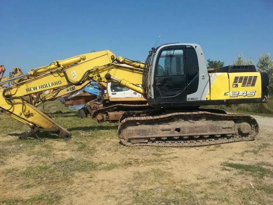 Dezmembrez excavator  New Holland E245 - piese de schimb New Holland