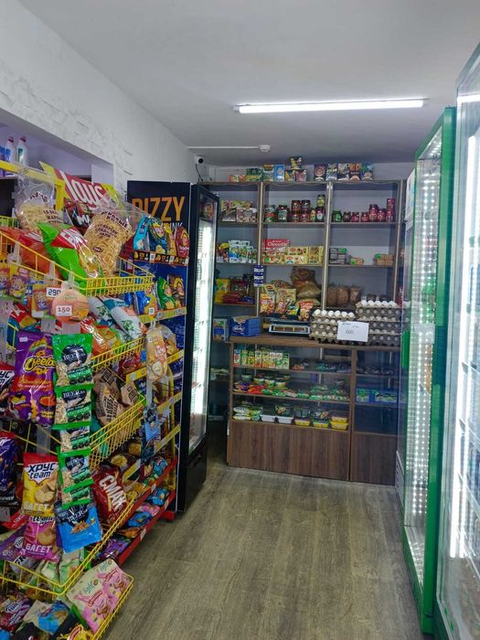 Продам действующии  магазин