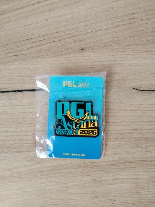 Значок PGl 2025.