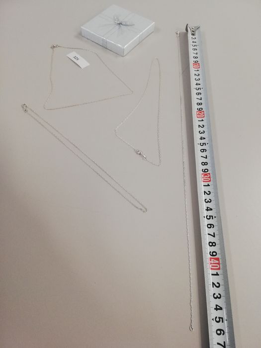 Сребърни нови синджири