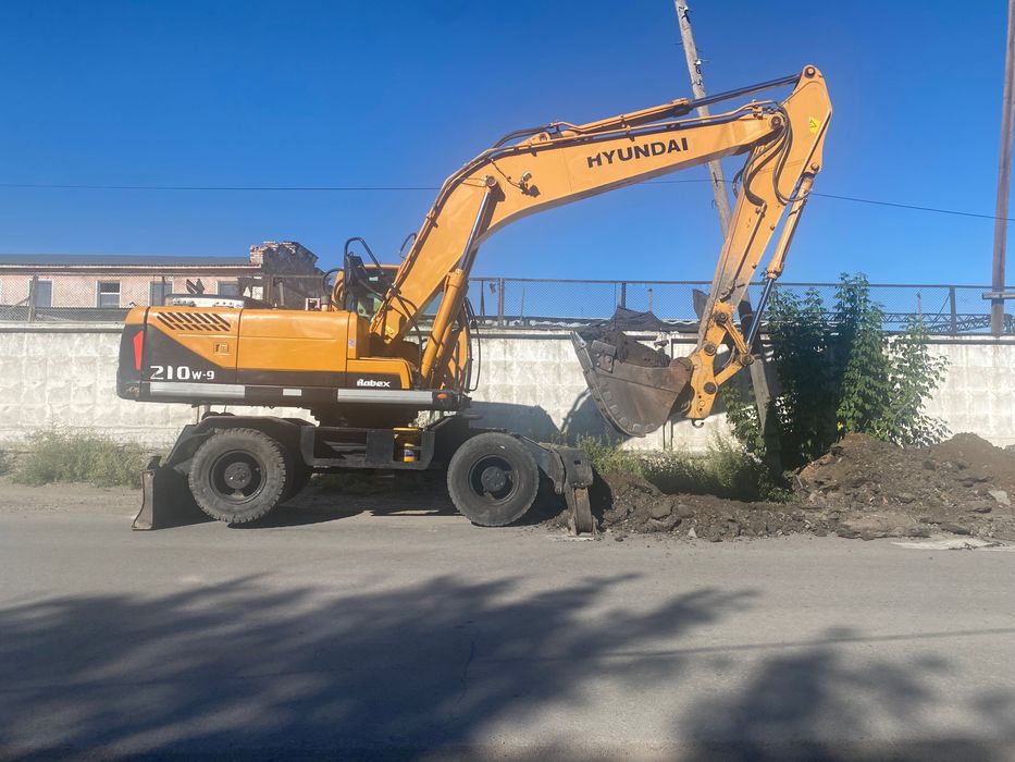 Услуги колесного экскаватора