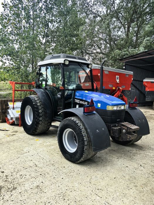 Tractor New Holland volan reversibil, freza forestiera tocător