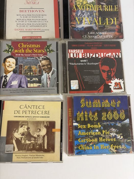 11 cd uri muzica si nu numai