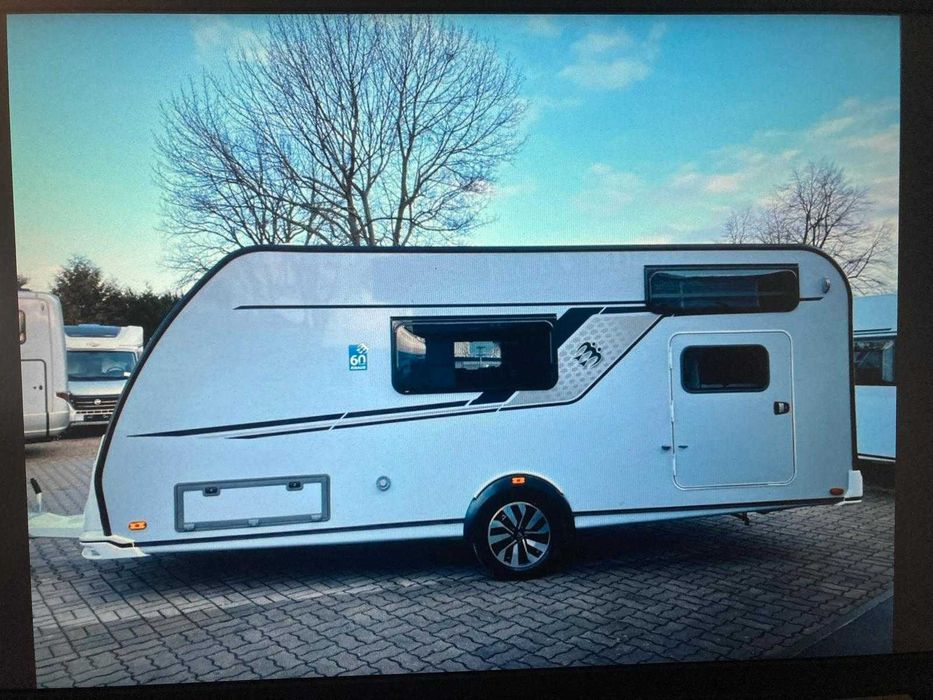 Knaus Südwind 500 QDK 60 Years 2023 | Marchiză Thule | Truma | 5-6 locuri |