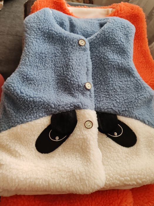 Безрукавка новая 2500