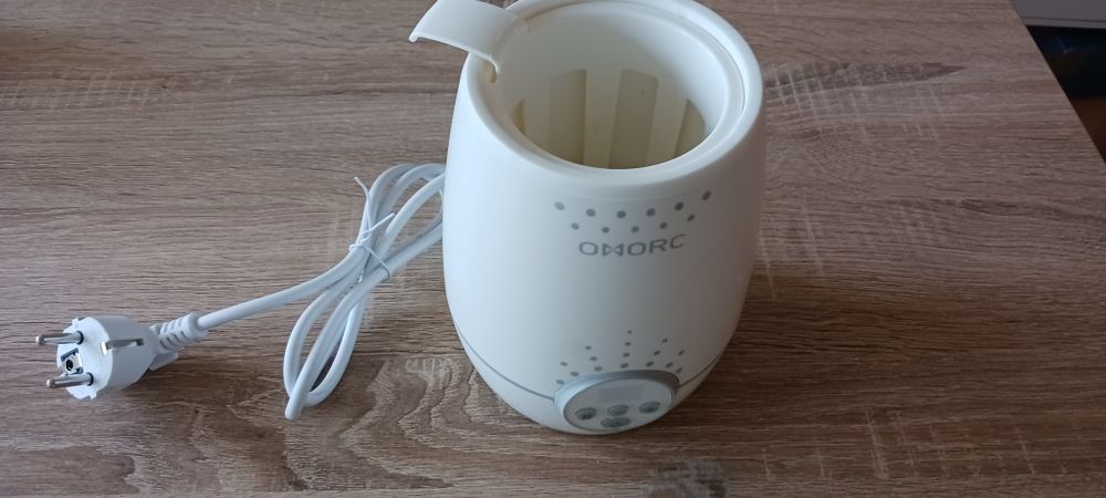 Уред за затопляне на бебешки бутилки и храна