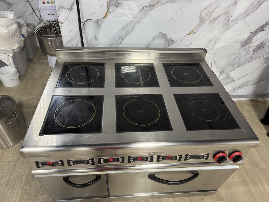 Продам индукционную плиту трехфазную 8-ми канфорную с печкой в 2 уровн