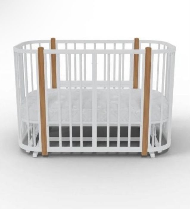 Детская кроватка с маятником